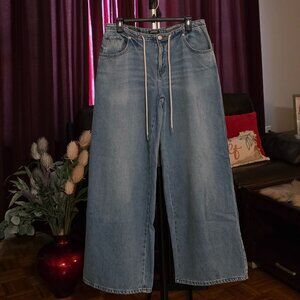 WILD FABLE LOW-RISE LOOSE JEANS.